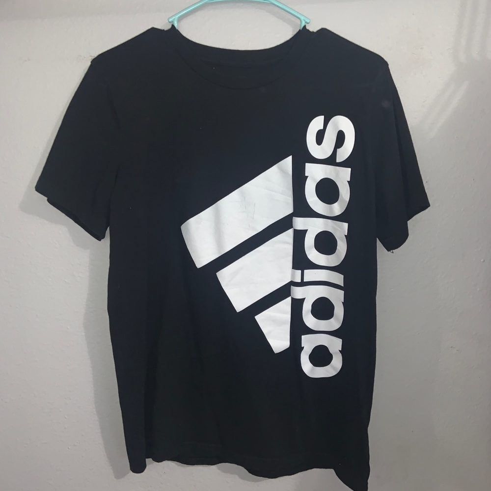 Adidas sideways logo.